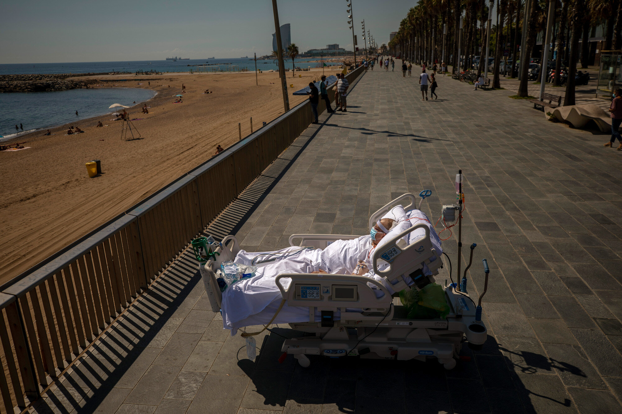 Francisco Espana looks at the Mediterranean sea from a promenade next to the Hospital del Mar in Barcelona, Spain, on Sept. 4, 2020. After 52 days in the hospital’s intensive care unit due to the coronavirus, Francisco was allowed by his doctors to spend almost ten minutes at the seaside as part of his recovery therapy. (AP Photo/Emilio Morenatti)