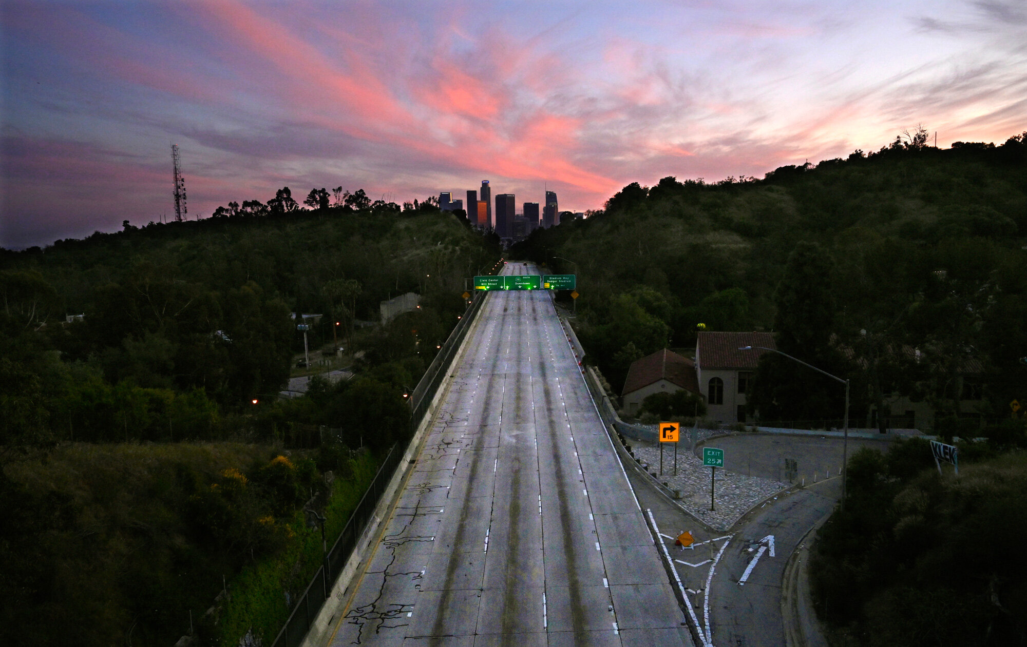  Lanes are empty on the 110 Arroyo Seco Parkway that leads to downtown Los Angeles on April 26, 2020, as California remains on lockdown to avoid the spread of the coronavirus. (AP Photo/Mark J. Terrill) 