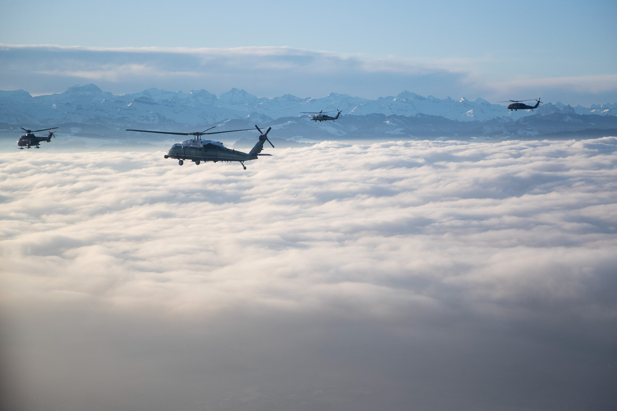Marine One carrying U.S. President Donald Trump flies to Davos, Switzerland, for the World Economic Forum on Jan. 21, 2020. (AP Photo/Evan Vucci)