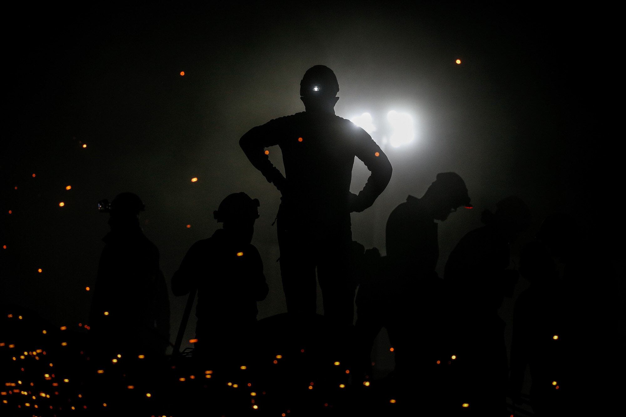  Rescuers search for survivors in the debris of a collapsed building in Izmir, Turkey, on Nov. 2, 2020, three days after a deadly earthquake struck the area. Two girls were dug out alive from the rubble of collapsed apartment buildings. (AP Photo/Emr