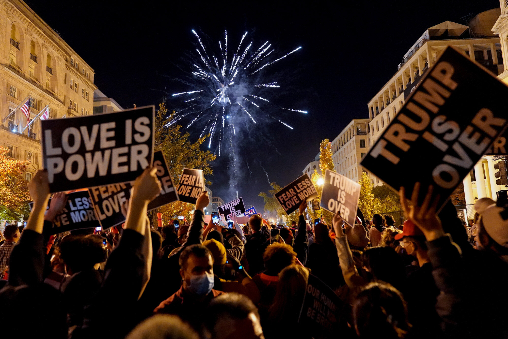 People shoot off fireworks in Washington’s Black Lives Matter Plaza while celebrating president-elect Joe Biden's win over President Donald Trump to become the 46th president of the United States on Nov. 7, 2020. (AP Photo/Jacquelyn Martin)