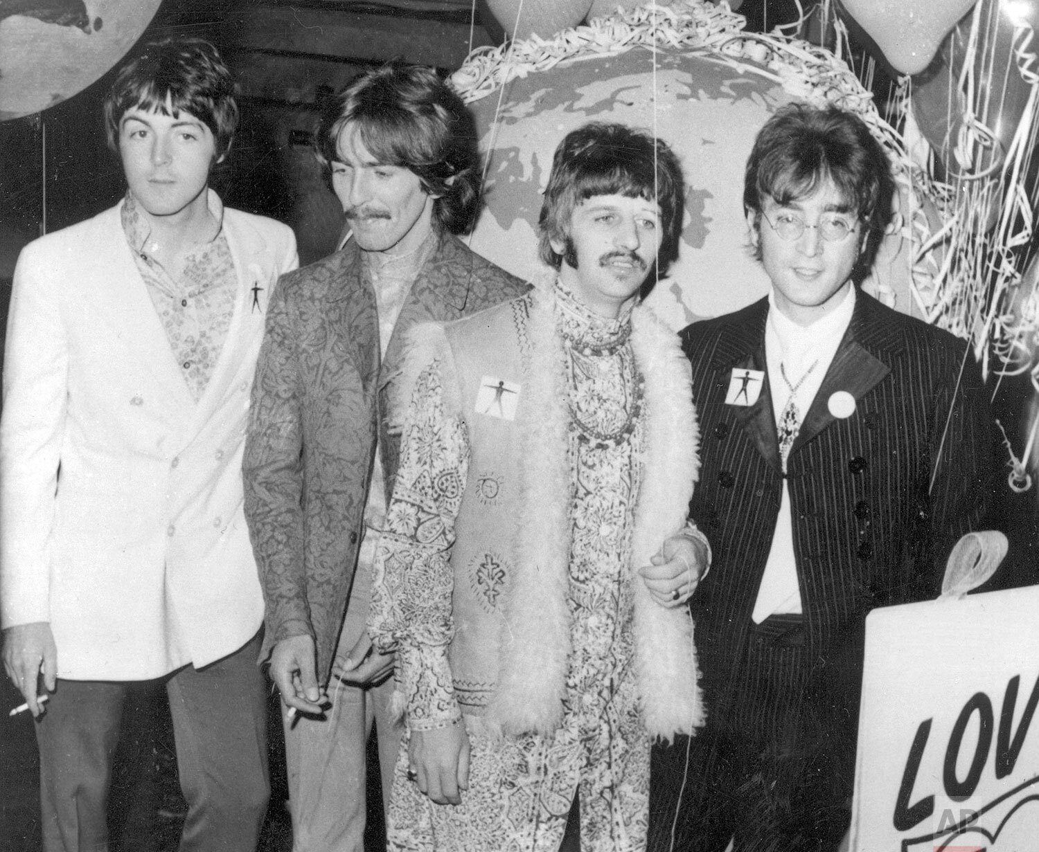  The Beatles, from left, Paul McCartney, George Harrison, Ringo Starr and John Lennon, appear at EMI Studios in London, June 24, 1967. (AP Photo) 