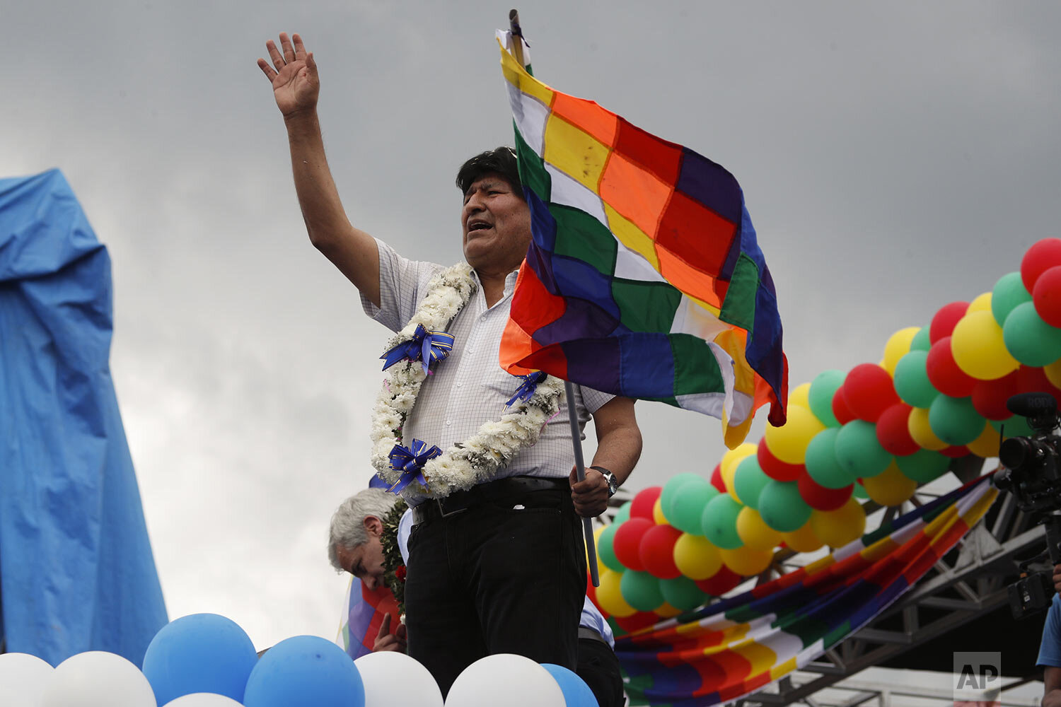  Former Bolivian President Evo Morales waves to supporters during a welcome rally in Chimore, Cochabamba province, Bolivia, Wednesday, Nov. 11, 2020, two days after returning from exile following an election that returned his socialist party to power