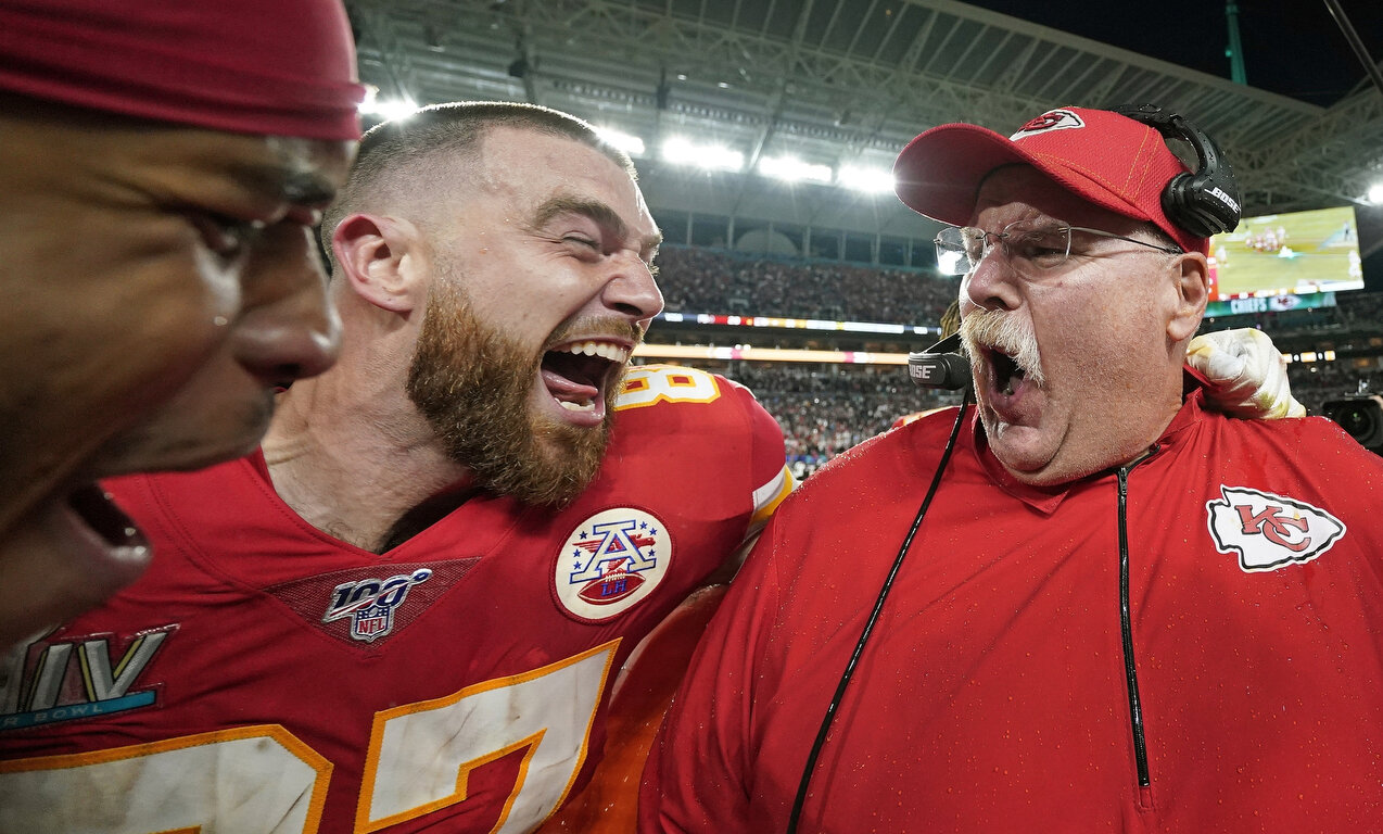  Kansas City Chiefs' Travis Kelce, left, celebrates with head coach Andy Reid after defeating the San Francisco 49ers in the NFL Super Bowl 54 football game Sunday, Feb. 2, 2020, in Miami Gardens, Fla. (AP Photo/David J. Phillip) 