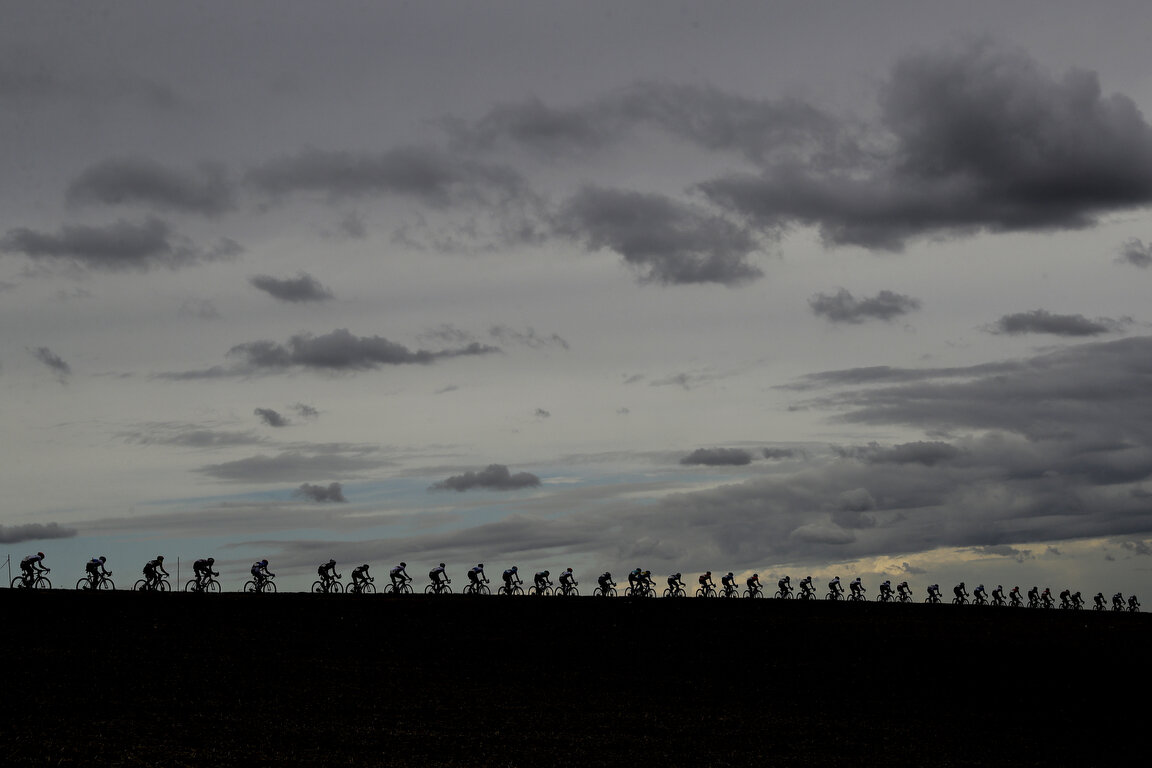  Riders pedal under a cloudy sky during the men's elite event, at the road cycling World Championships, in Imola, Italy, Sunday, Sept. 27, 2020. (AP Photo/Andrew Medichini) 