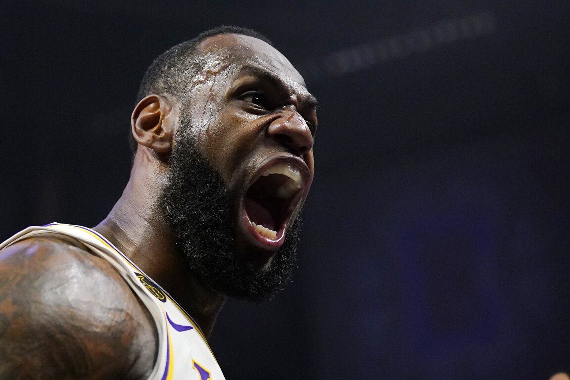  Los Angeles Lakers forward LeBron James celebrates after scoring and drawing a foul during the second half of an NBA basketball game against the Los Angeles Clippers Sunday, March 8, 2020, in Los Angeles. (AP Photo/Mark J. Terrill) 