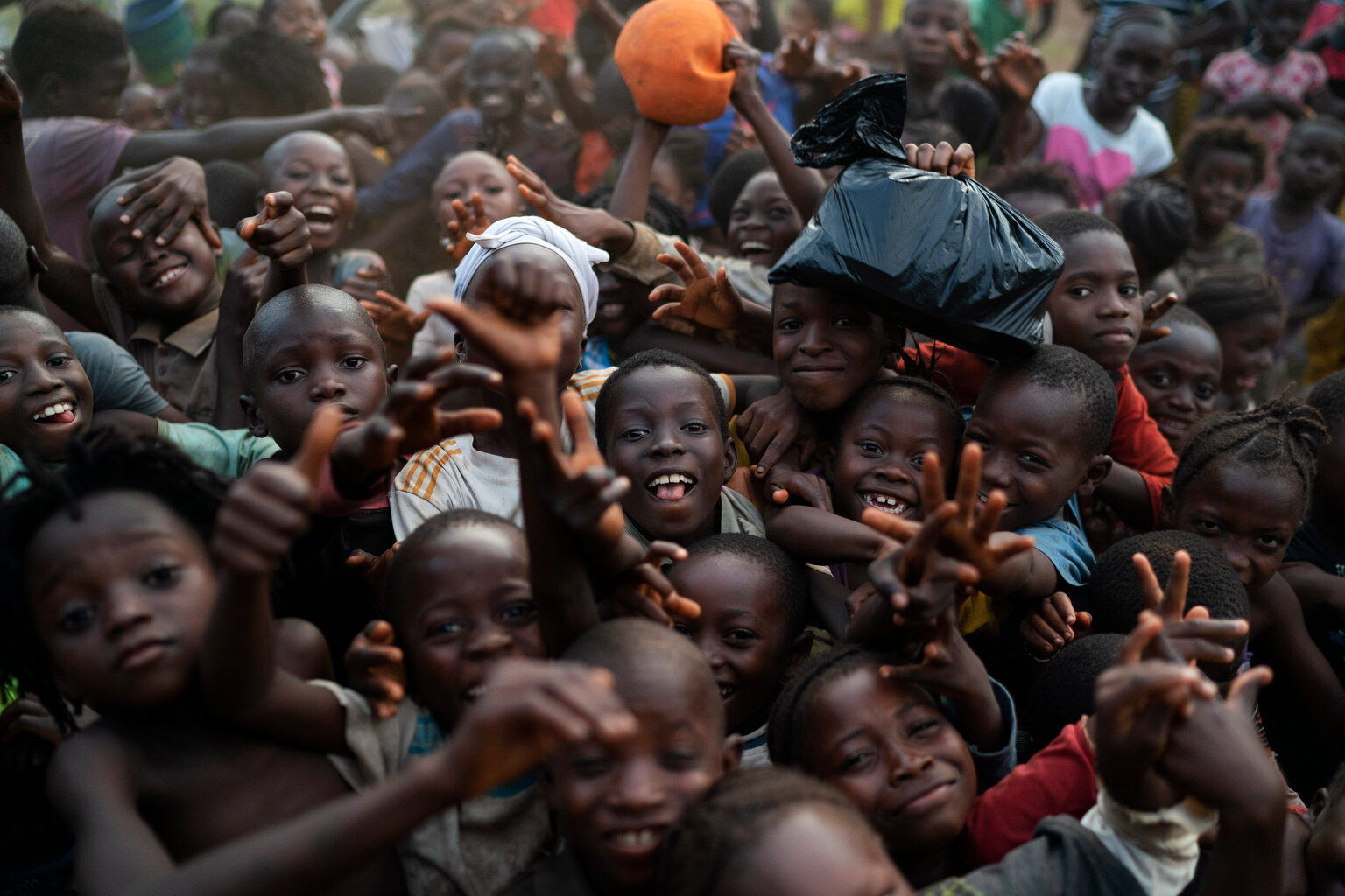  Children pose for a photo in Komao village, on the outskirts of Koidu, district of Kono, Sierra Leone, Sunday, Nov. 22, 2020. (AP Photo/Leo Correa) 