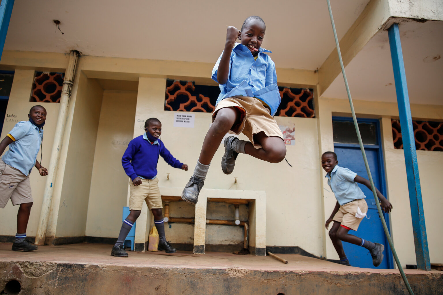  Schoolchildren joke around and play at the Olympic Primary School in Kibera, one of the capital Nairobi's poorest areas, in Kenya Monday, Oct. 12, 2020. (AP Photo/Brian Inganga) 