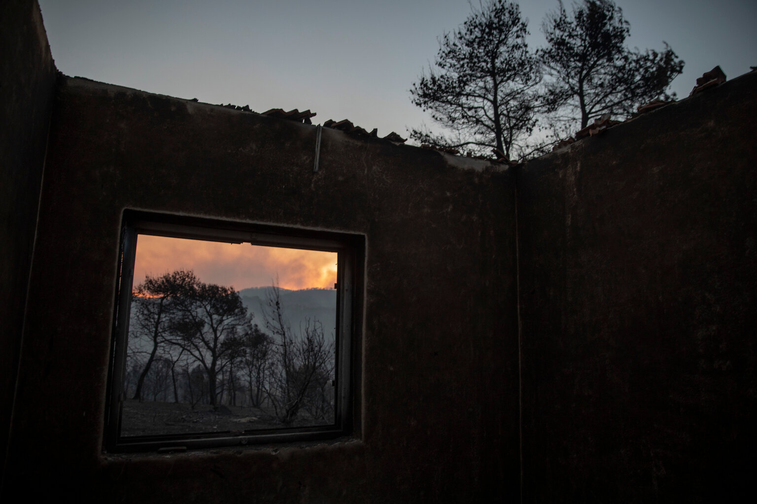  A burned house at the village of Galataki ,near Corinth, 80 kilometers (50 miles) southwest of  Athens, on Thursday July 23, 2020. (AP Photo/Petros Giannakouris) 