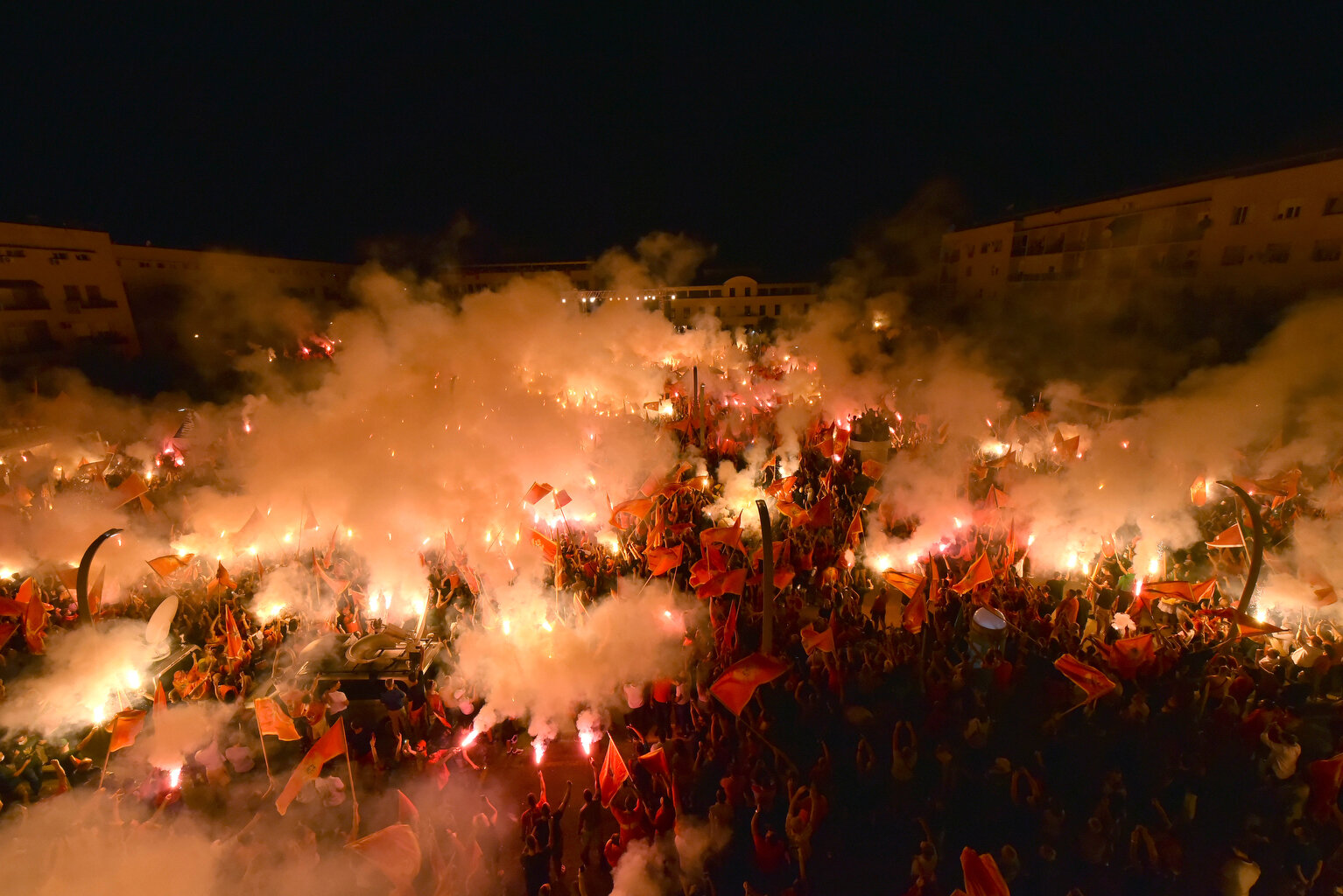  Protesters light torches during a rally in Podgorica, Montenegro, Sunday, Sept. 6, 2020. (AP Photo/Risto Bozovic) 