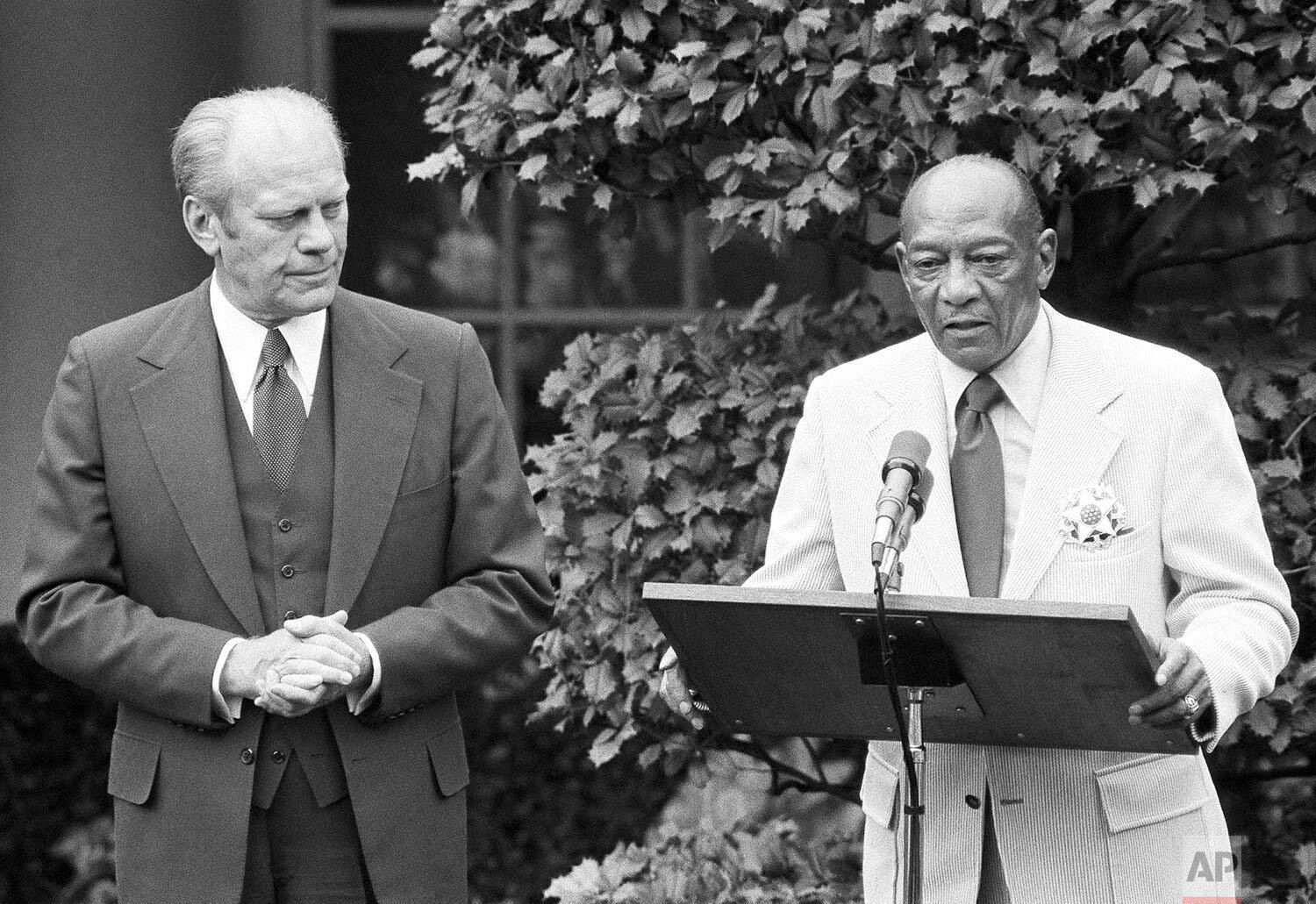  President Gerald Ford with Olympic gold medalist Jesse Owens after presenting him with the Medal of Freedom in a White House East Garden ceremony in Washington on August 5, 1976. Ford feted United States Olympic teams with a reception inside the Exe