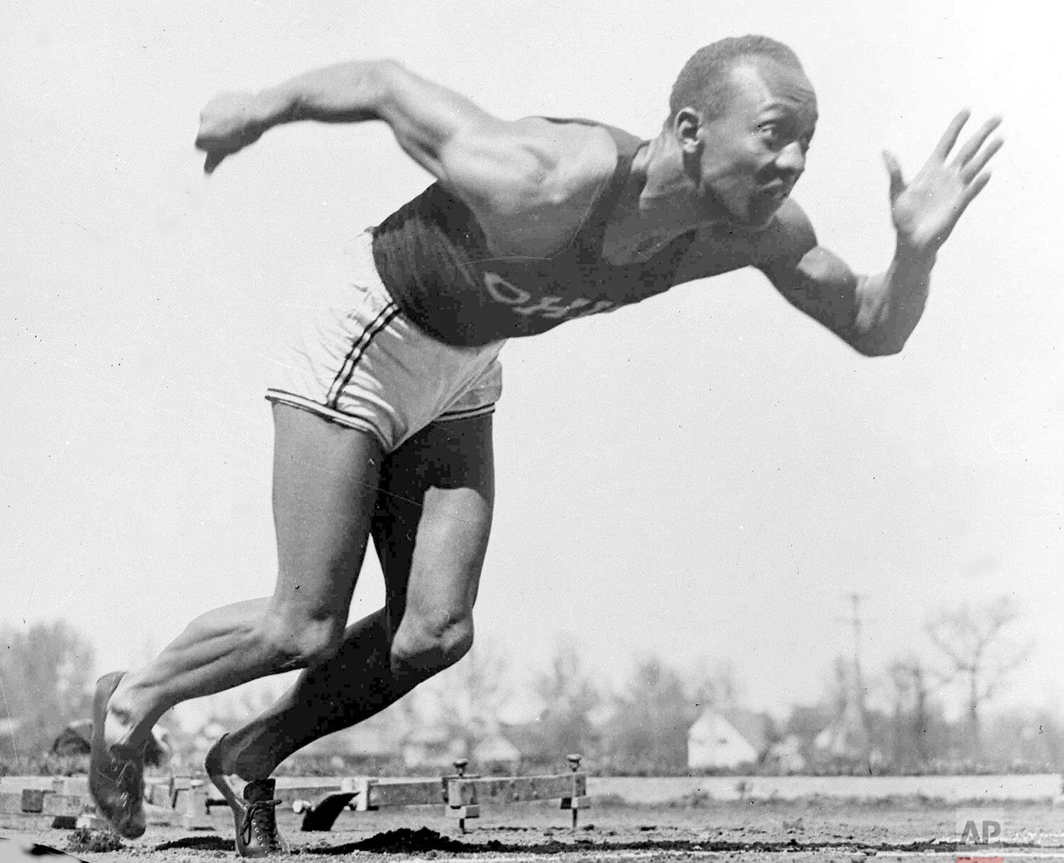  American athlete Jesse Owens practices in the Olympic Village in Berlin, Aug. 5, 1936.  Shortly after Owens returned home from his snubbing by Adolph Hitler at the 1936 Olympics, he and America's 17 other black Olympians found a less-than-welcoming 