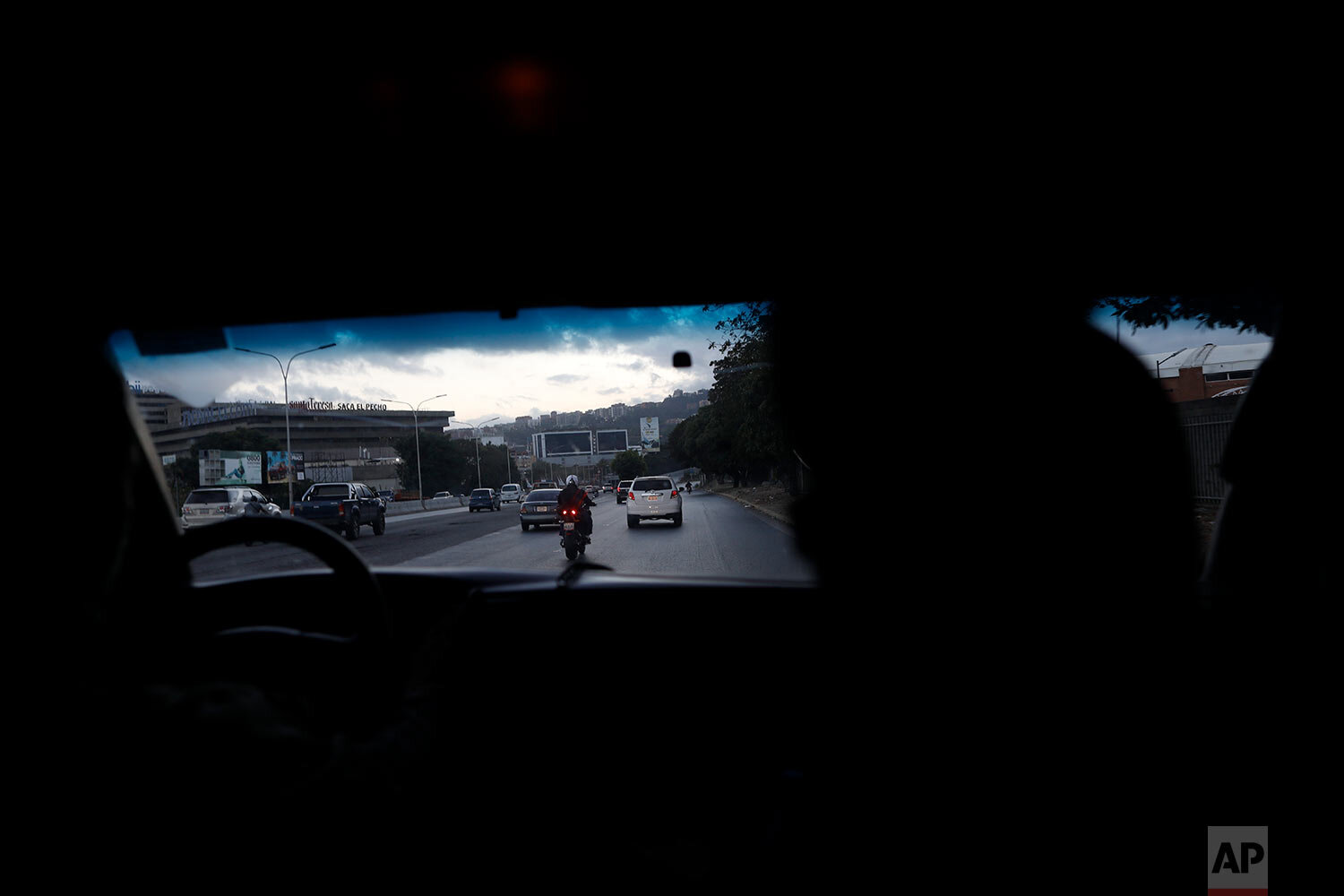  Angels of the Road volunteer paramedics drive their one ambulance on a highway in Caracas, Venezuela, Monday, Feb. 8, 2021. (AP Photo/Ariana Cubillos) 