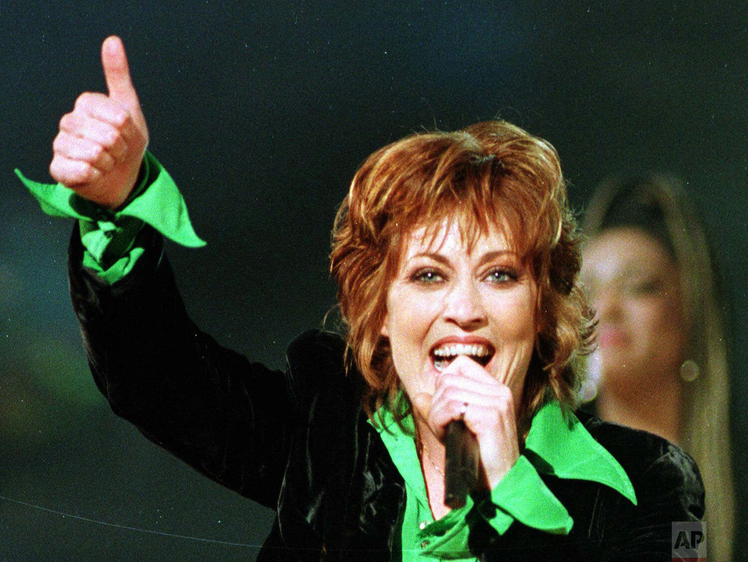  Katrina Leskanavich, a native of Topeka, Kan., sings "Love Shine a Light," at the 1997 Eurovision Song Contest at the Point Theatre in Dublin, Ireland, May 3, 1997.   (AP Photo/Dave Caulkin) 