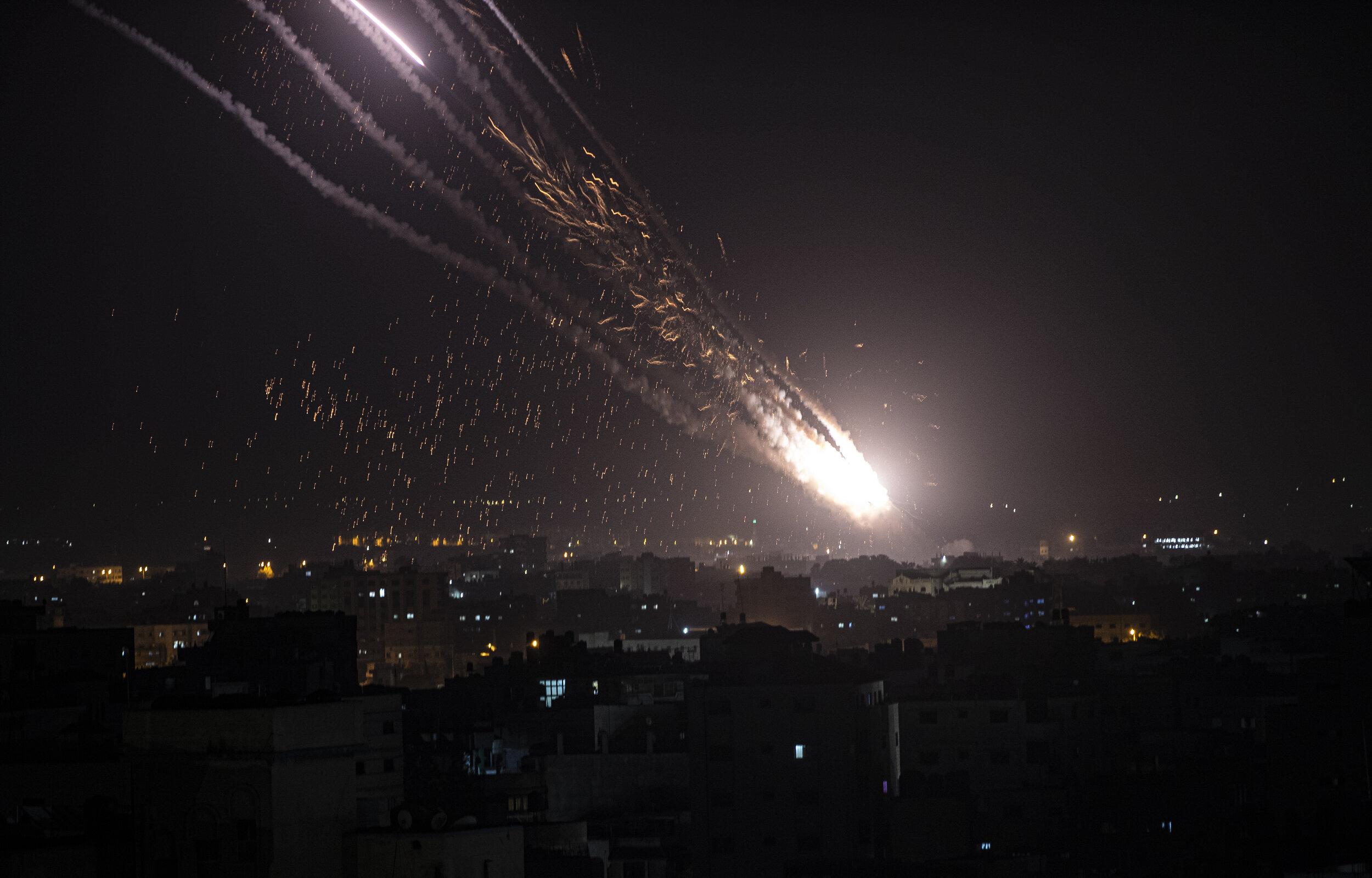  Rockets are launched from the Gaza Strip towards Israel, Monday, May. 10, 2021. Hamas militants fired dozens of rockets into Israel on Monday, including a barrage that set off air raid sirens as far away as Jerusalem, after hundreds of Palestinians 