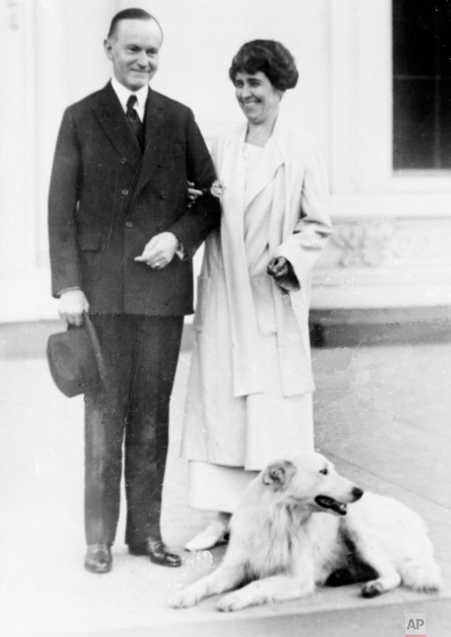  U.S. President Calvin Coolidge and first lady Grace Coolidge are shown with their dog at the White House portico in Washington, D.C., on Nov. 5, 1924.  (AP Photo) 