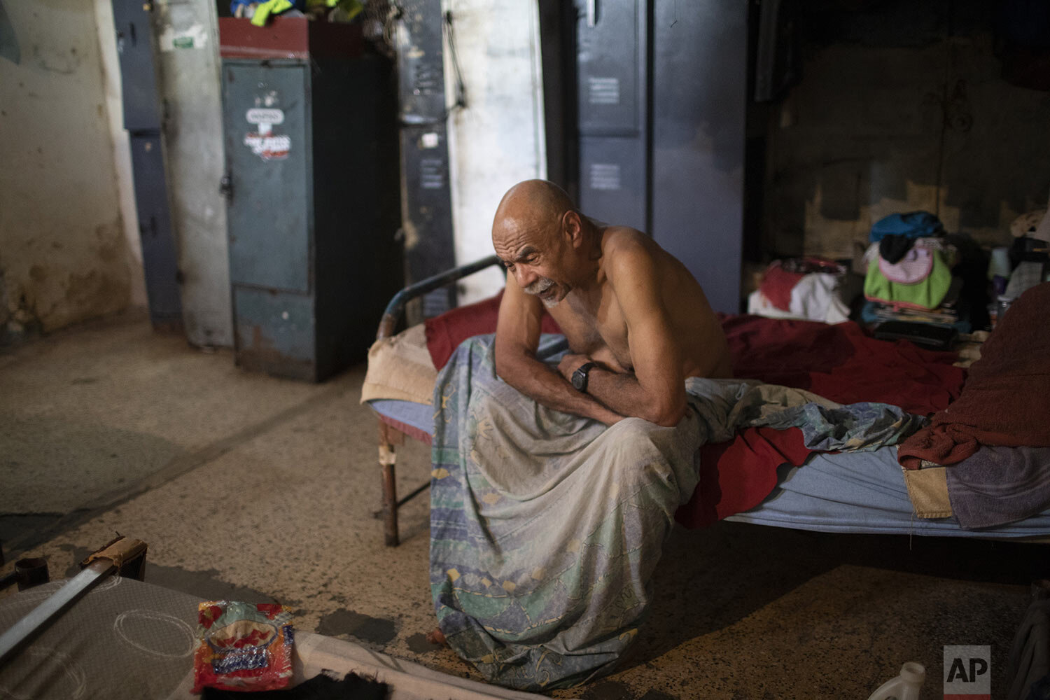  Luis Rocio sits on his bed inside a shared bedroom at the Nosotros Unidos Foundation, a home for the elderly where he has been living for over a year, just before the COVID-19 pandemic began in Caracas, Venezuela, May 14, 2021. Rocio, 70, said he wo