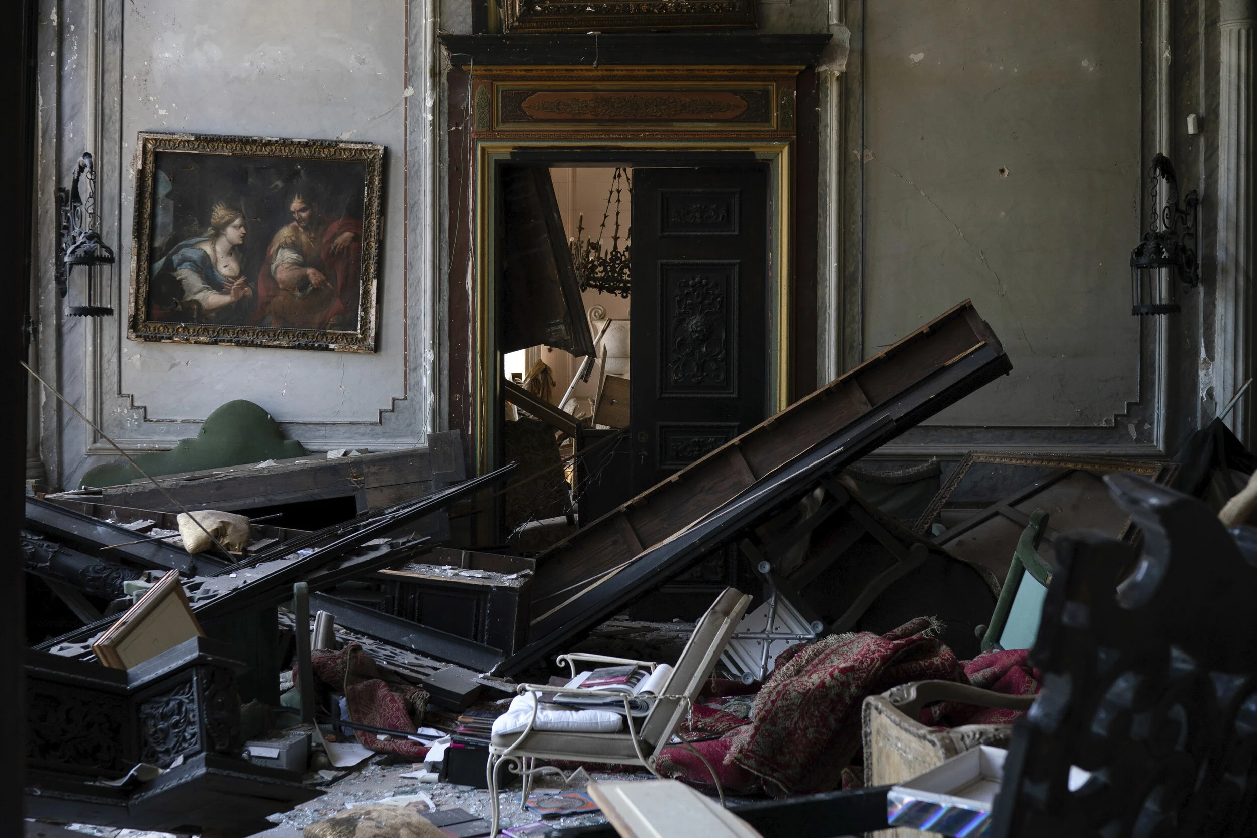  A painting hangs on the wall of a heavily damaged room in the Sursock Palace after the explosion in the seaport of Beirut, Lebanon, Aug. 8, 2020. The Sursock palace, built in 1860 in the heart of historical Beirut on top of a hill overlooking the no