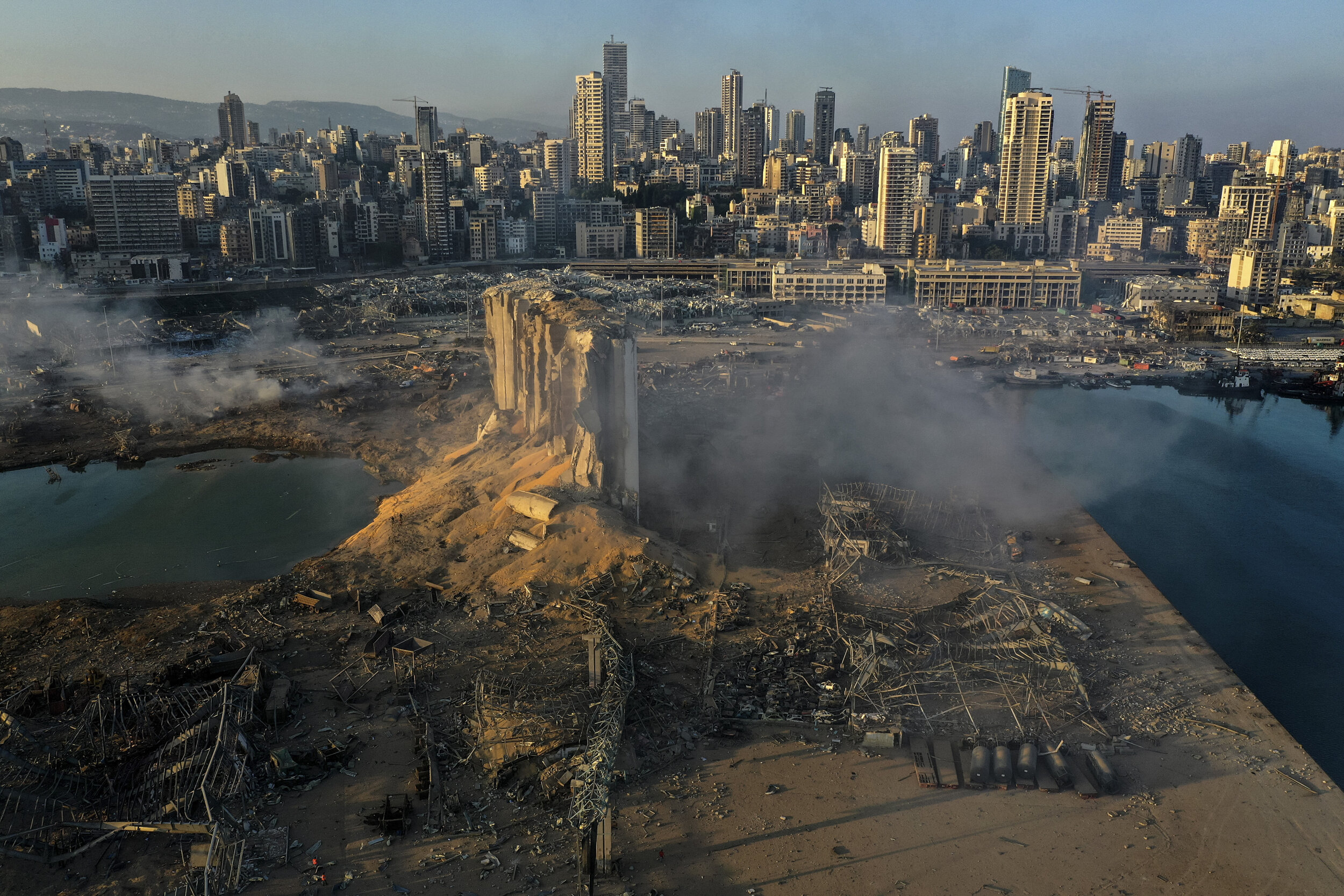  A drone picture shows the scene of an explosion at the seaport of Beirut, Lebanon, Aug. 5, 2020. (AP Photo/Hussein Malla) 