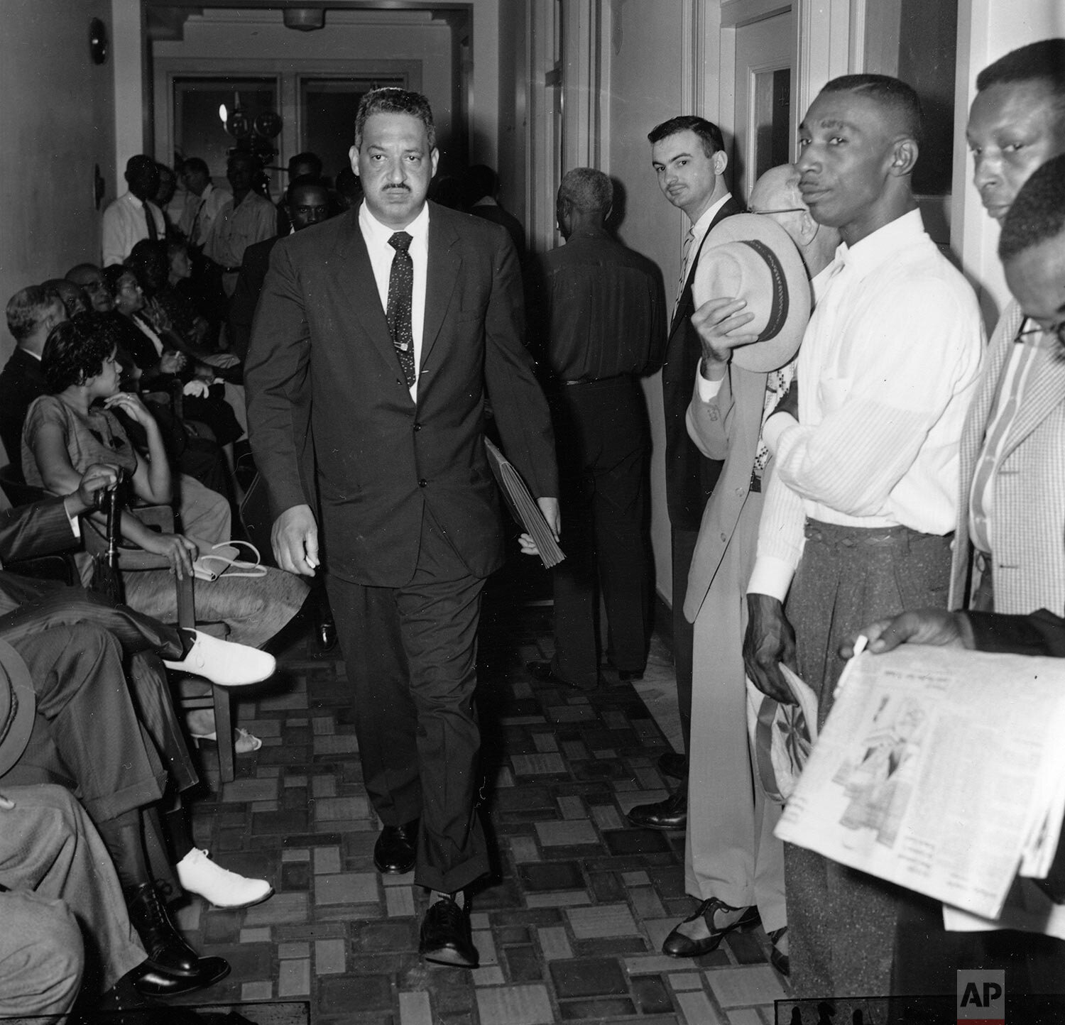  Thurgood Marshall, attorney for the National Association for the Advancement of Colored People, or NAACP, arrives at the U.S. District Court in Little Rock, Ark., on September 20, 1957. Federal Judge R. Davies is presiding over an injunction hearing