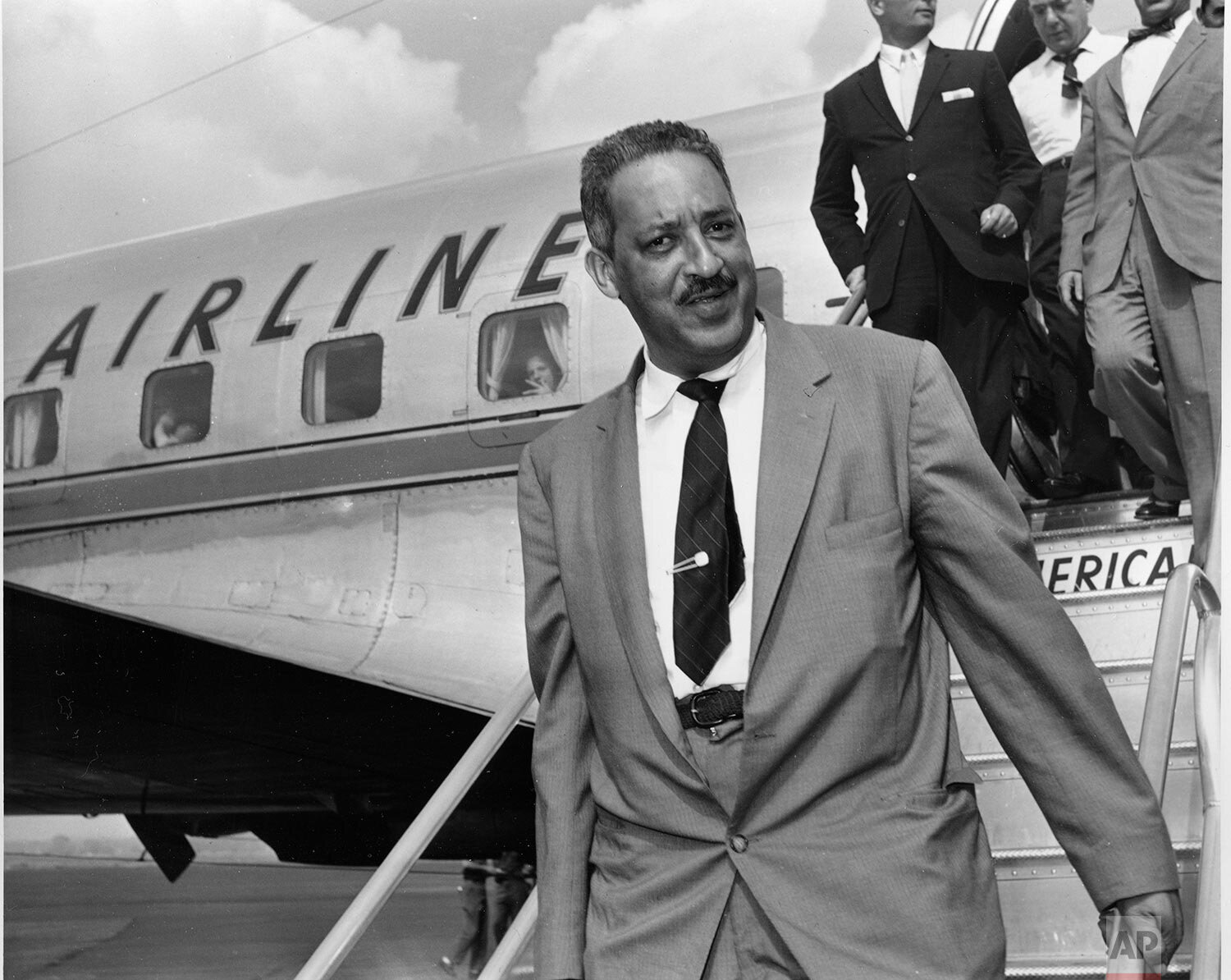  Thurgood Marshall, attorney for the National Association for the Advancement of Colored People, or NAACP, arrives at National Airport in Washington, August 22, 1958, to file appeal with the Supreme Court in the integration case of Central High Schoo