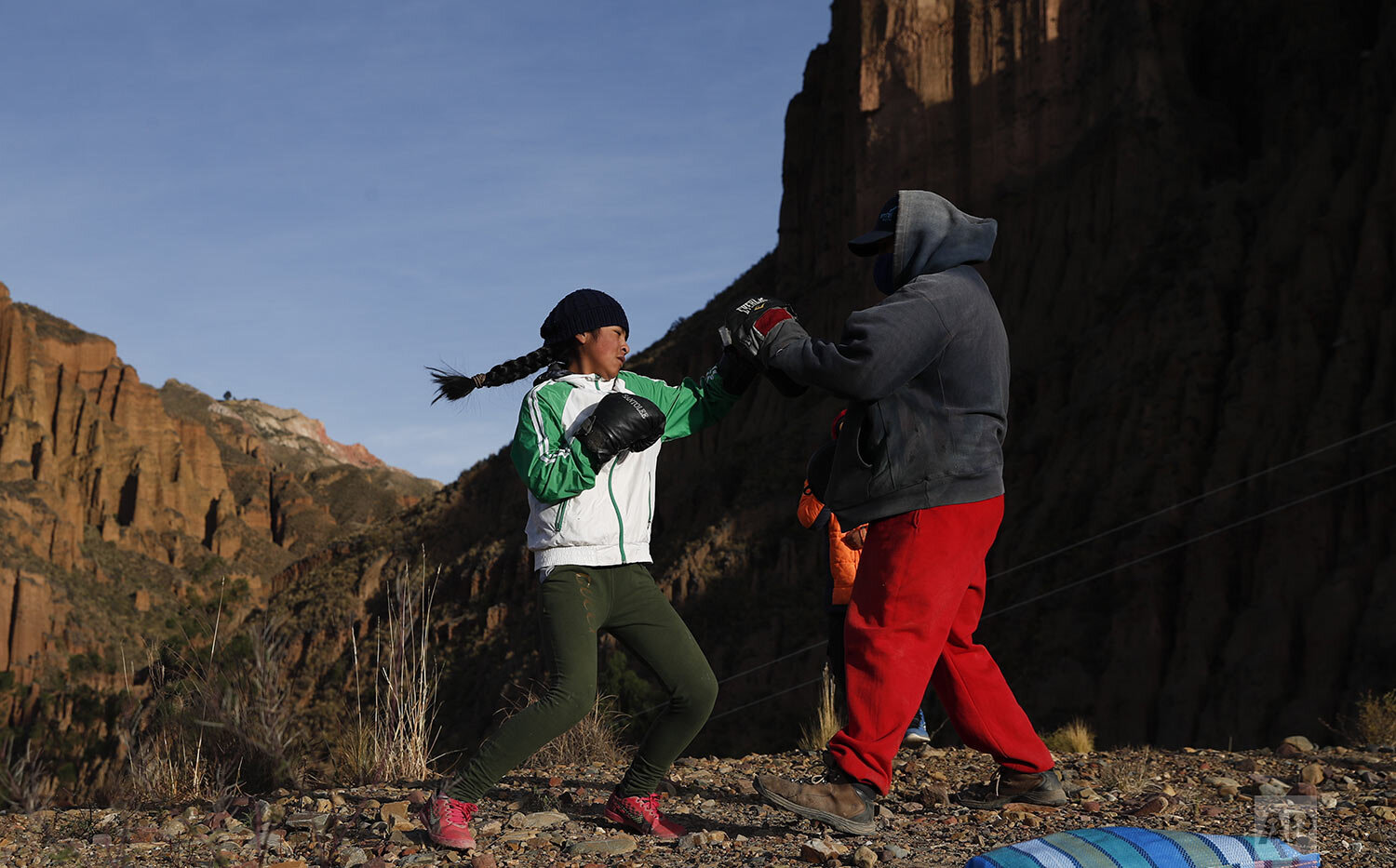  Gracce Kelly Flores, a 12-year-old boxer who goes by the nickname Hand of Stone, does her daily boxing workout as she trains with her father Alberto Flores in Palca, Bolivia June 10, 2021, amid the COVID-19 pandemic. At age 8, Flores defeated a 10-y