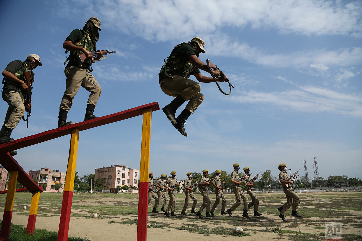  Special police officer recruits, who completed nearly three months of physical training, demonstrate their skills at Kathua in Indian-controlled Kashmir, Saturday, June 5, 2021.  (AP Photo/Channi Anand) 