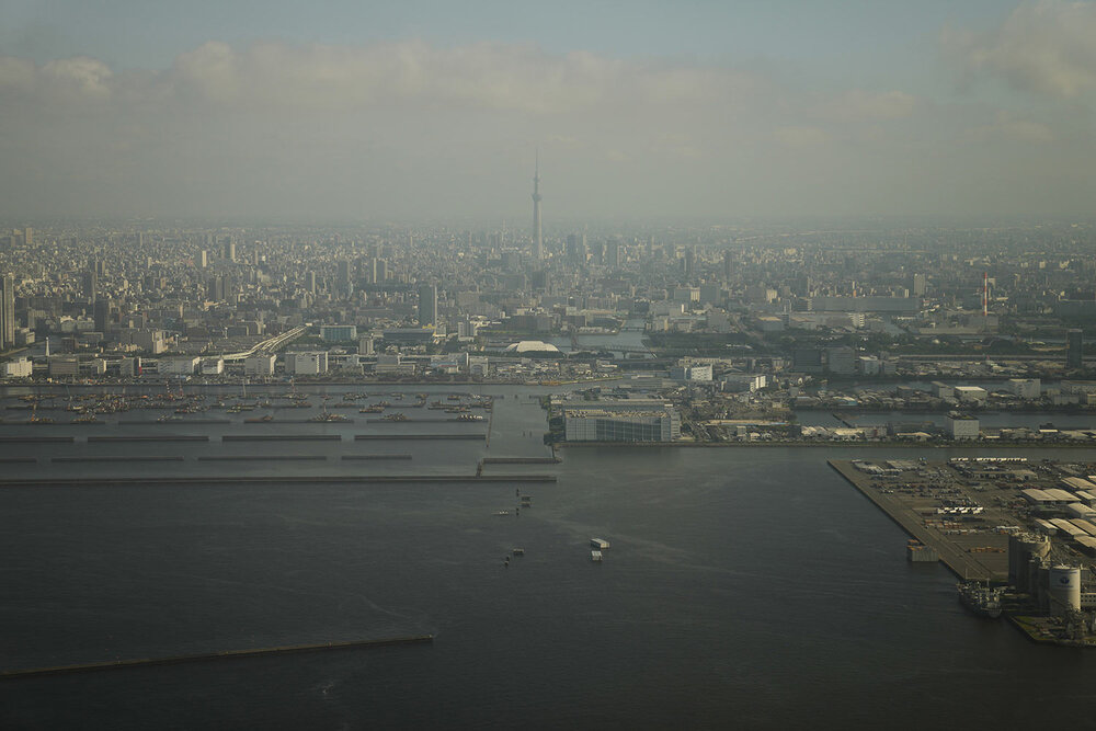  The Tokyo Skytree is seen through the window of an airplane upon approaching Haneda Airport in Tokyo, Monday, July 19, 2021. (AP Photo/Natacha Pisarenko) 