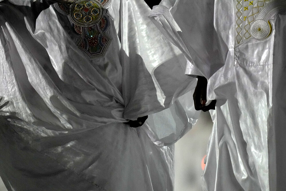  Team member of Mali walks during the opening ceremony in the Olympic Stadium at the 2020 Summer Olympics, Friday, July 23, 2021, in Tokyo, Japan. (AP Photo/Petr David Josek) 