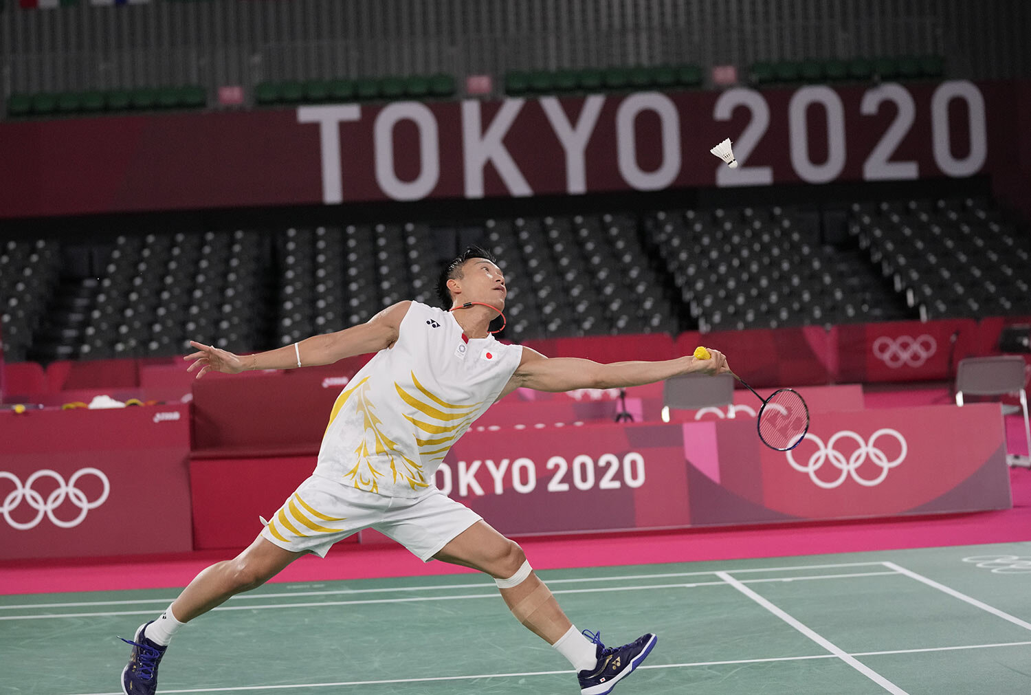  Kento Momota of Japan competes against USA's Timothy Lam during men's singles Badminton match at the 2020 Summer Olympics, Sunday, July 25, 2021, in Tokyo, Japan. (AP Photo/Dita Alangkara) 