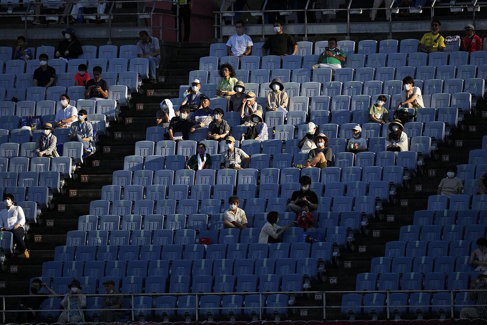  Spectators watch during a women's soccer match between China and Zambia at the 2020 Summer Olympics, Saturday, July 24, 2021, in Miyagi, Japan. (AP Photo/Andre Penner) 