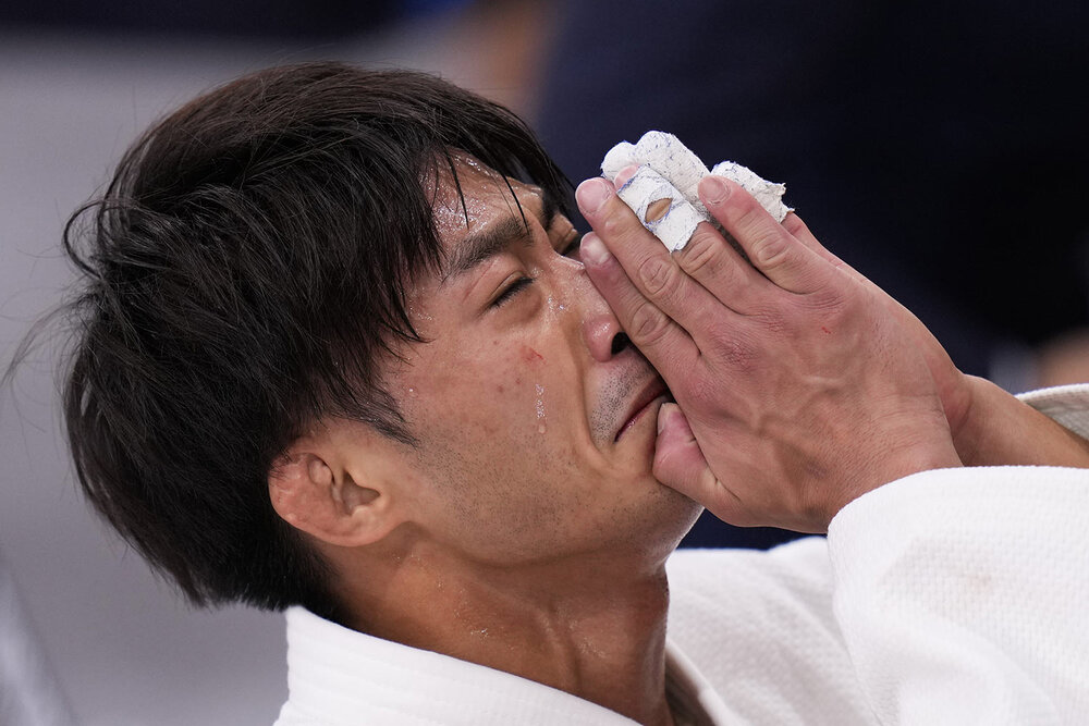  Yang Yung-wei, of Taiwan, reacts after his loss to Naohisa Takato, of Japan, in a men's -60kg judo gold medal match at the 2020 Summer Olympics, Saturday, July 24, 2021, in Tokyo. (AP Photo/Jae C. Hong) 