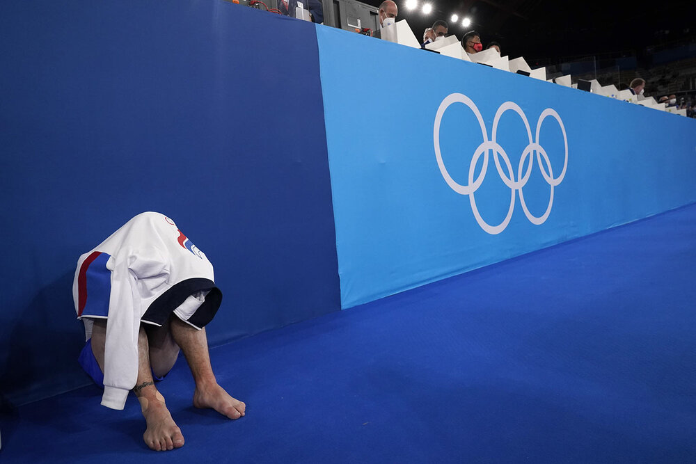  Nikita Nagornyy, of Russian Olympic Committee, reacts after winning gold medal in the artistic men's team final at the 2020 Summer Olympics, Monday, July 26, 2021, in Tokyo. (AP Photo/Gregory Bull) 