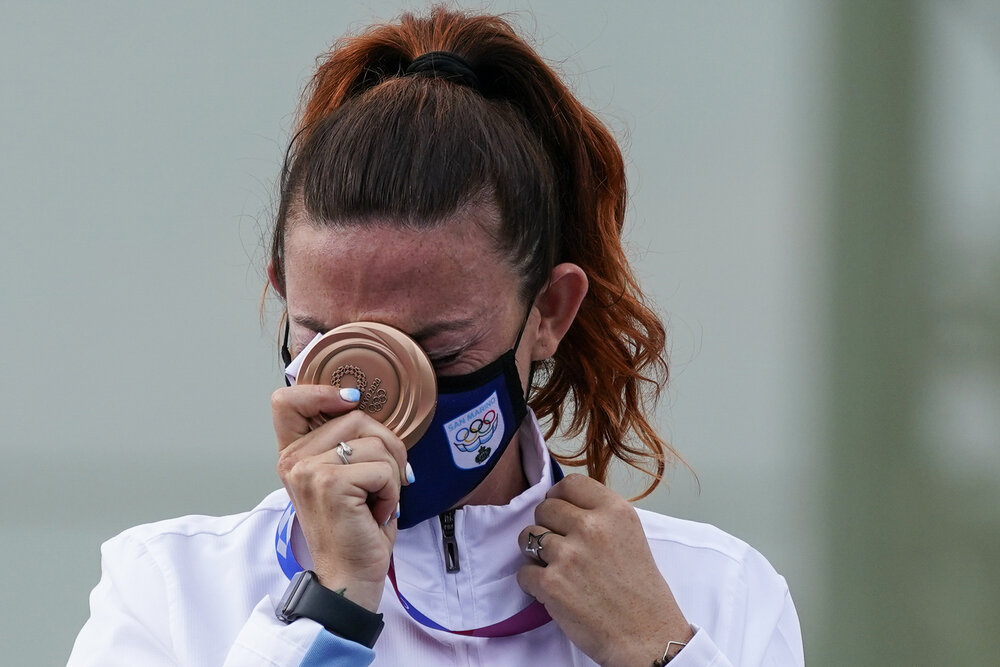  Bronze medalist Alessandra Perilli, of San Marino, celebrates after the women's trap at the Asaka Shooting Range in the 2020 Summer Olympics, Thursday, July 29, 2021, in Tokyo, Japan. (AP Photo/Alex Brandon) 