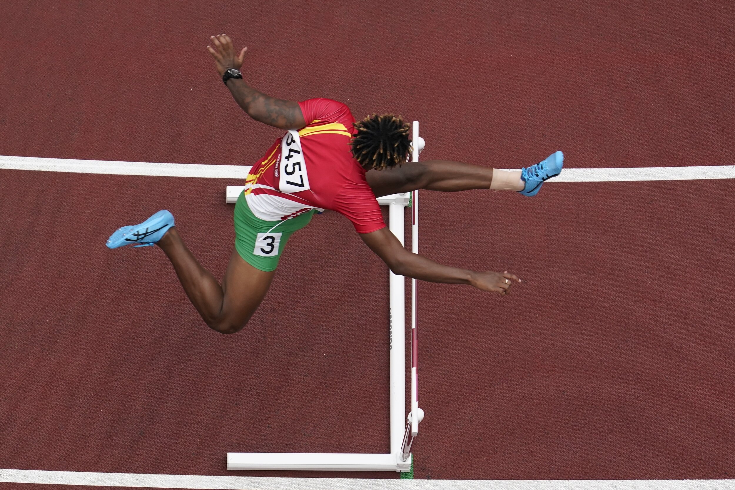  Ned Azemia, of Seychelles, competes during the first round of the men's 400-meter hurdles at the 2020 Summer Olympics, Friday, July 30, 2021, in Tokyo. (AP Photo/Morry Gash) 
