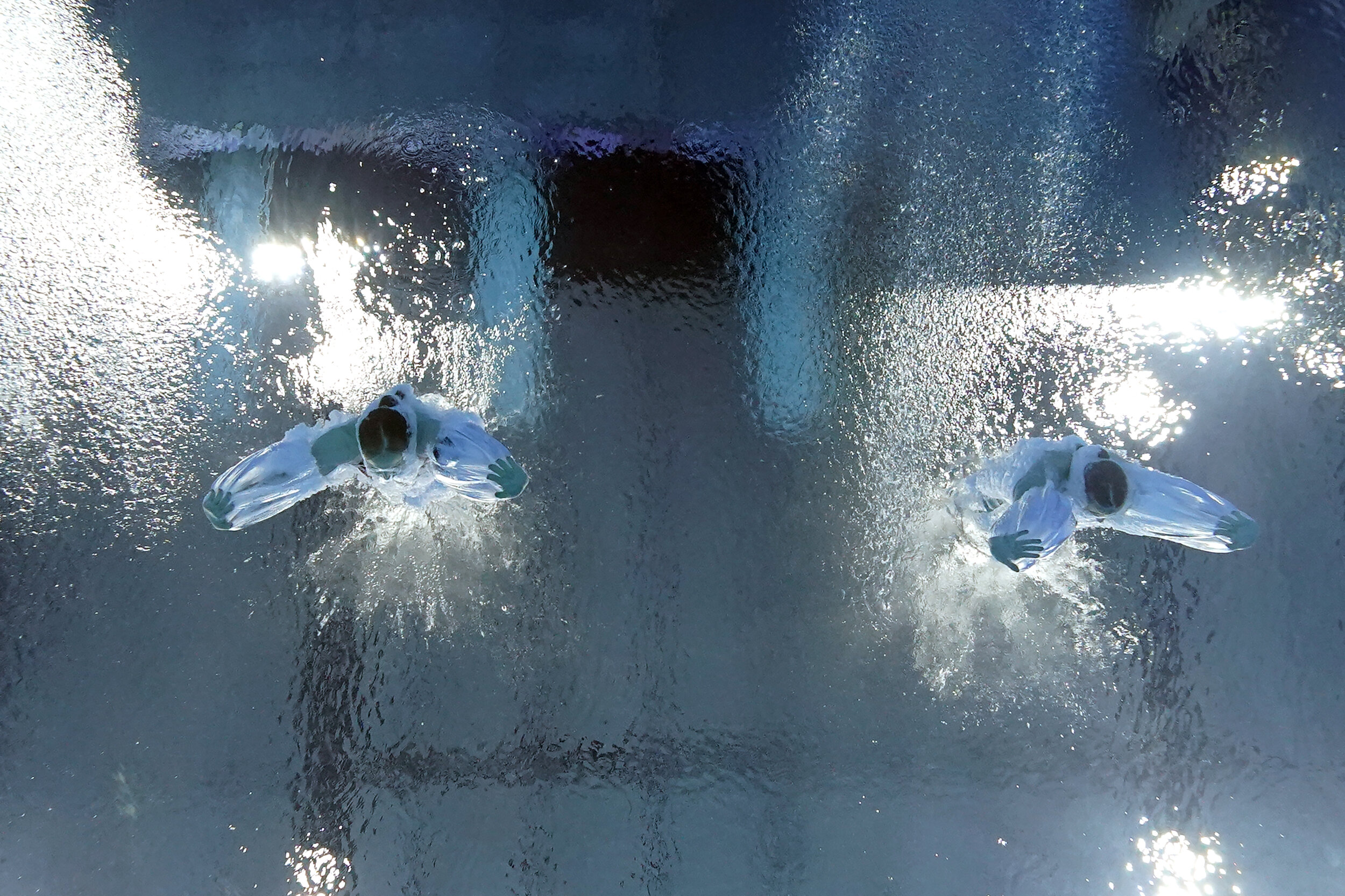  Bronze medalist Germany's Lena Hentschel and Tina Punzel compete in the synchronized 3-meter springboard final at the 2020 Summer Olympics, Sunday, July 25, 2021, in Tokyo. (AP Photo/David J. Phillip) 