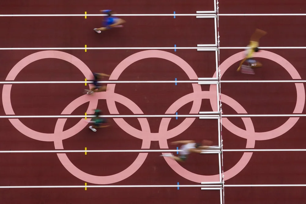  Runners competes during the first round of the men's 400-meter hurdles at the 2020 Summer Olympics, Friday, July 30, 2021, in Tokyo. (AP Photo/Morry Gash) 