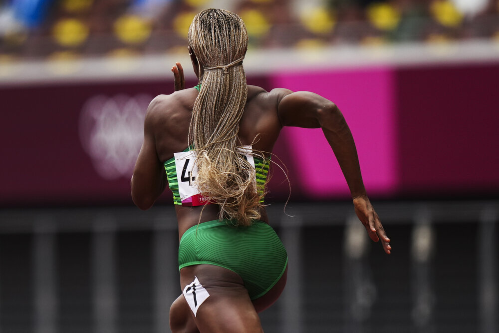  Roda Njobvu, of Zambia, runs in her heat of the women's 100-meters at the 2020 Summer Olympics, Friday, July 30, 2021, in Tokyo. (AP Photo/Matthias Schrader) 