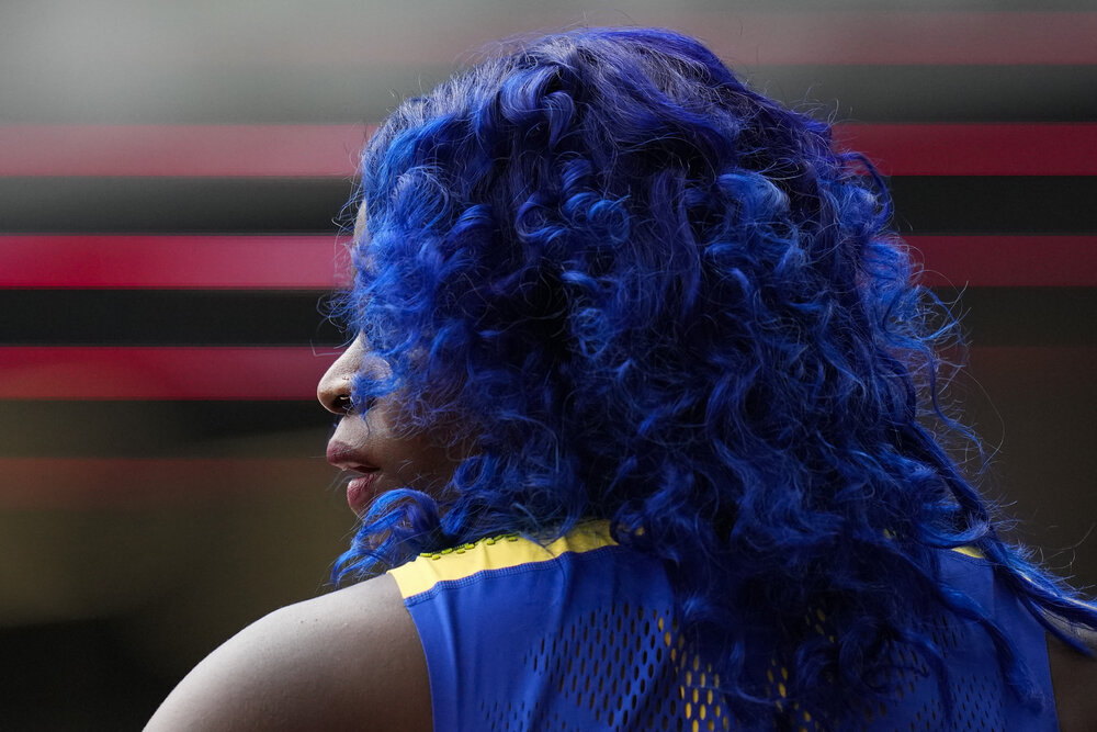  Tia-Adana Belle, of Barbados, gets ready to compete in a heat in the women's 400-meter hurdles at the 2020 Summer Olympics, Saturday, July 31, 2021, in Tokyo. (AP Photo/Petr David Josek) 