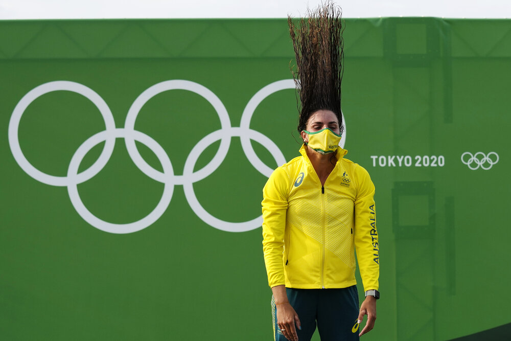  Jessica Fox of Australia throws back her hair during the medal ceremony after winning gold in the Women's C1 in the Canoe Slalom at the 2020 Summer Olympics, Thursday, July 29, 2021, in Tokyo, Japan. (AP Photo/Kirsty Wigglesworth) 
