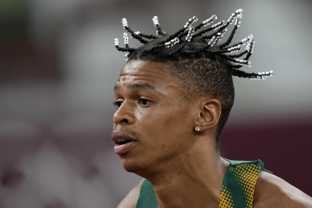  Shaun Maswanganyi, of South Africa, warms up for his heat of the men's 100-meters at the 2020 Summer Olympics, Saturday, July 31, 2021, in Tokyo. (AP Photo/David J. Phillip) 