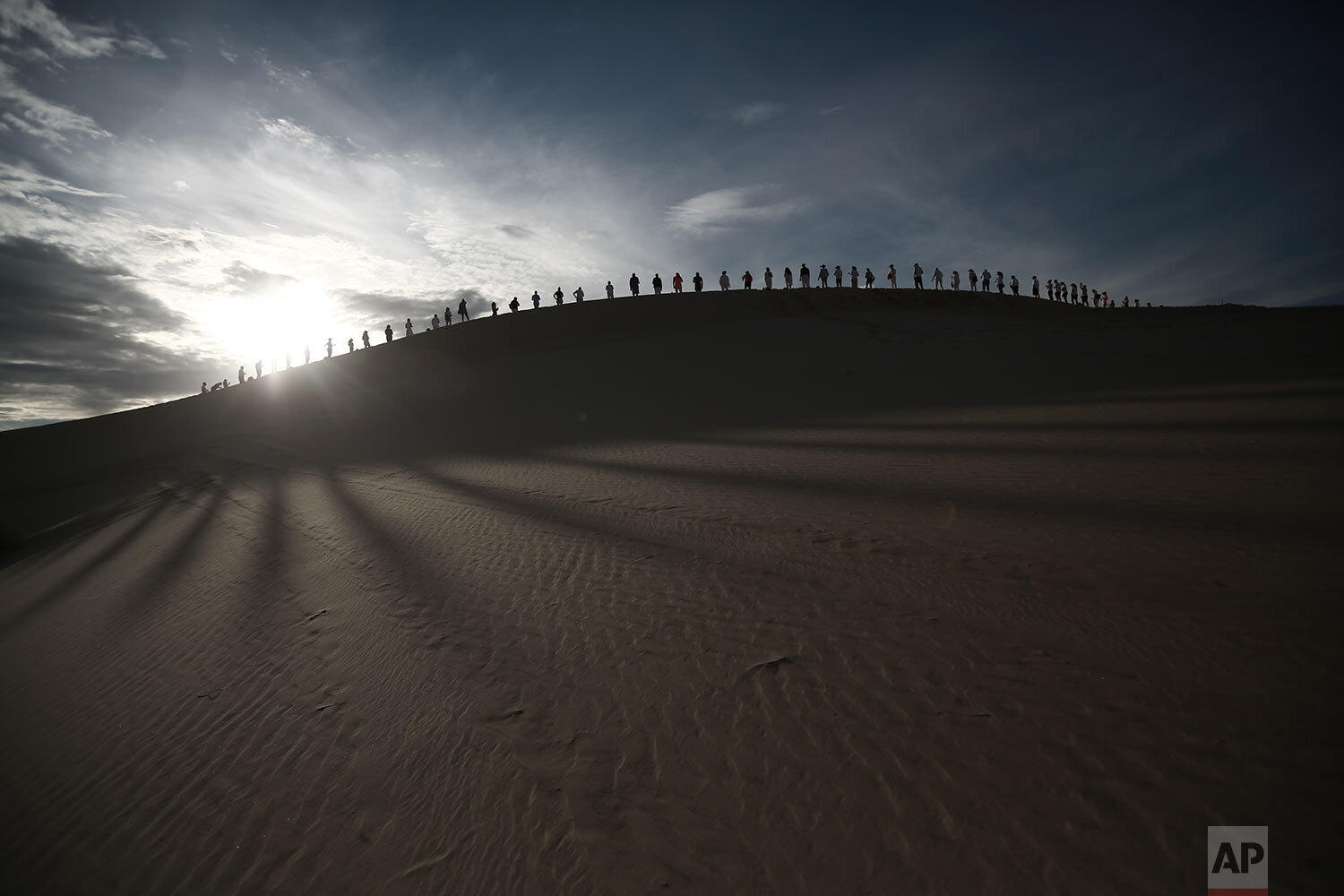  Yoga enthusiasts gather on the Samalayuca Dunes near Ciudad Juarez, Mexico for the 6th annual “Yoga in the Dunes” event⁠⁠, Saturday, July 3, 2021. Yoga studio organizers said this year’s event was held as a symbol of hope for those who have survived