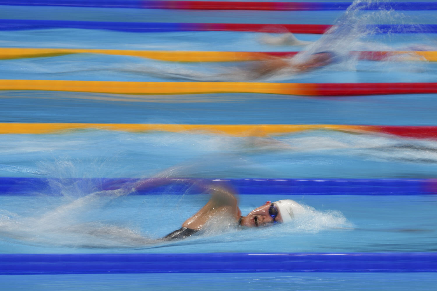  Dakyung Han, of South Korea, swims in a heat during the women's 1500-meter freestyle at the 2020 Summer Olympics, Monday, July 26, 2021, in Tokyo, Japan. (AP Photo/Matthias Schrader) 