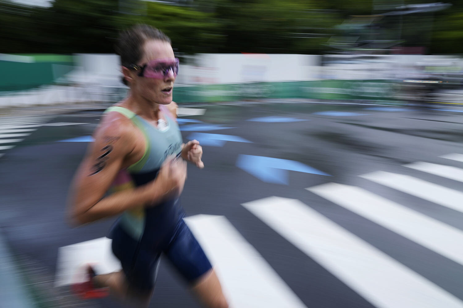  Flora Duffy, of Bermuda, runs during the women's triathlon competition at the 2020 Summer Olympics Tuesday, July 27, 2021, in Tokyo, Japan. (AP Photo/Eugene Hoshiko) 
