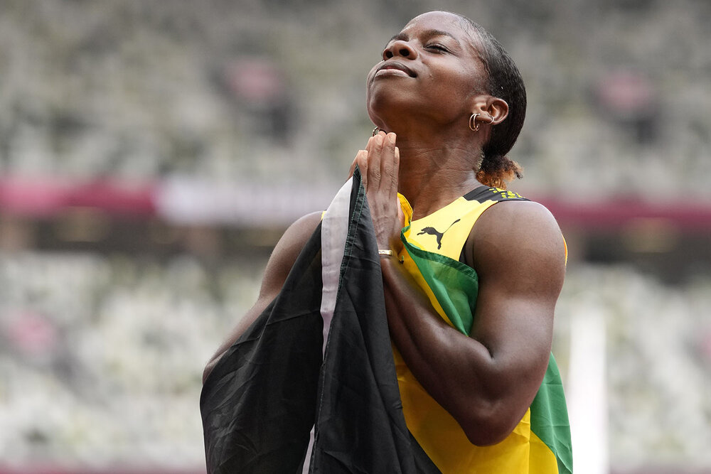  Megan Tapper, of Jamaica, reacts after the women's 100-meters hurdles final at the 2020 Summer Olympics, Monday, Aug. 2, 2021, in Tokyo. (AP Photo/Petr David Josek) 