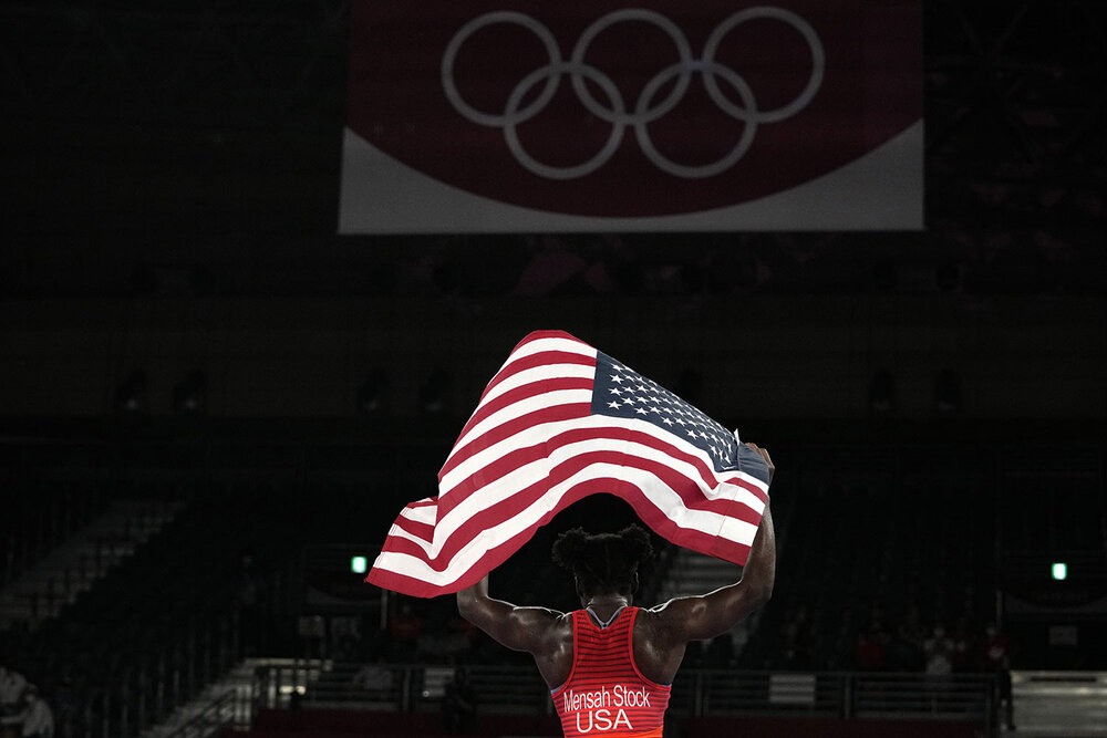  United States Tamyra Marianna Stock Mensah celebrates defeating Nigeria's Blessing Oborududu and winning the women's 68kg Freestyle wrestling final match at the 2020 Summer Olympics, Tuesday, Aug. 3, 2021, in Chiba, Japan. (AP Photo/Aaron Favila) 