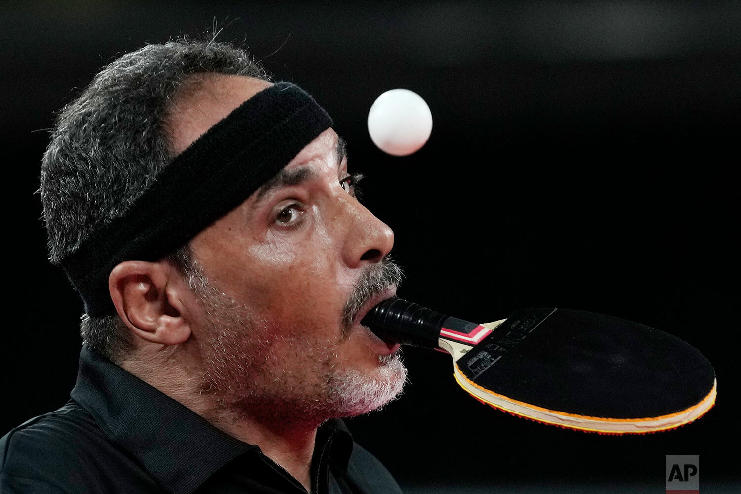  Ibrahim Hamadtou of Egypt plays against Park Hong-kyu of South Korea in Class 6, Group E of men's table tennis at the Tokyo 2020 Paralympic Games Wednesday, Aug. 25, 2021, in Tokyo. (AP Photo/Eugene Hoshiko) 