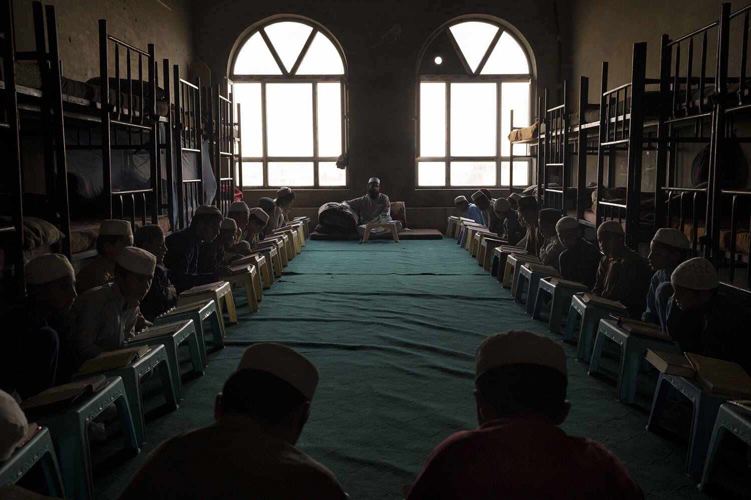 Afghan boys read the Quran, Islam's holy book, during class at the Khatamul Anbiya madrasa in Kabul, Afghanistan, Wednesday, Sept. 29, 2021. (AP Photo/Felipe Dana)