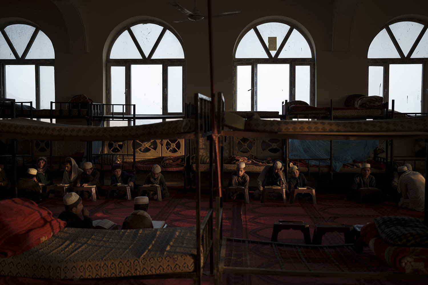 Afghan boys read the Quran, Islam's holy book, during class at the Khatamul Anbiya madrasa in Kabul, Afghanistan, Wednesday, Sept. 29, 2021. (AP Photo/Felipe Dana)