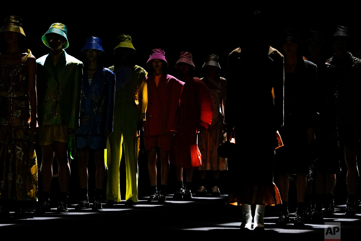  Models present creations by Chinese designer Zheng Wei in her Mackzheng collection during the China Fashion Week in Beijing, Sunday, Sept. 12, 2021. (AP Photo/Andy Wong) 